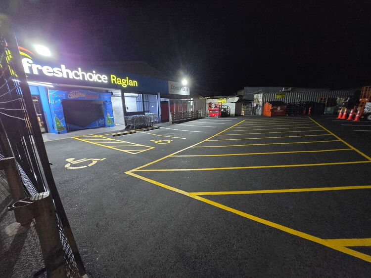 Completed car park at FreshChoice Raglan with new accessible parking and loading bay line markings.